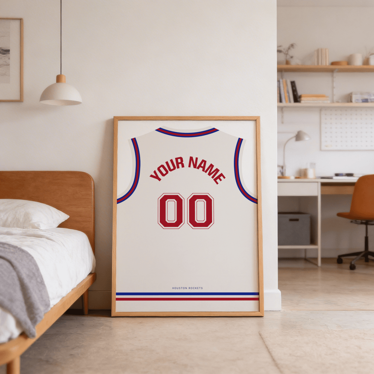 Basketball Jersey Poster in White with Red Number leaning on the floor by a wooden bed in a bedroom