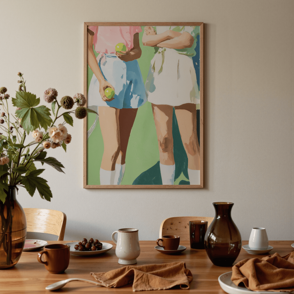 Tennis Girls Art Print framed close-up with two women tennis players in pastel colours above a wooden dining table