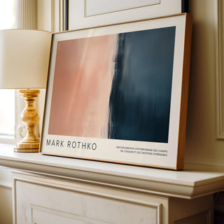 Framed Color Block Wall Art leaning on a shelf with amber and dark blue blocks beside a gold lamp