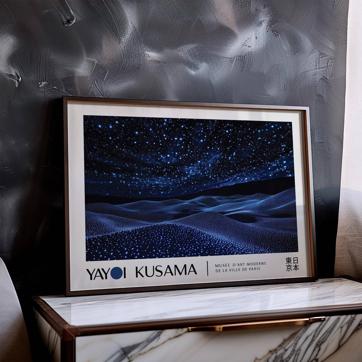 Night Sky wall art with starry night sky and waves leaning on a marble surface