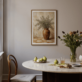 Rustic Olive Art framed print of olive branches in a brown vase above dining table with pears on plate