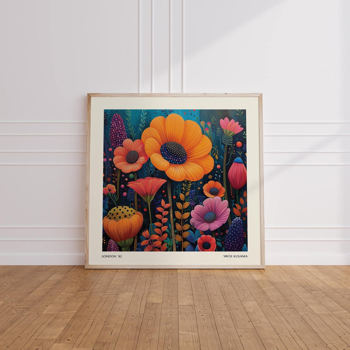 Framed Japanese Modern Art of colourful petals featuring orange and pink flowers leaning on a wooden floor