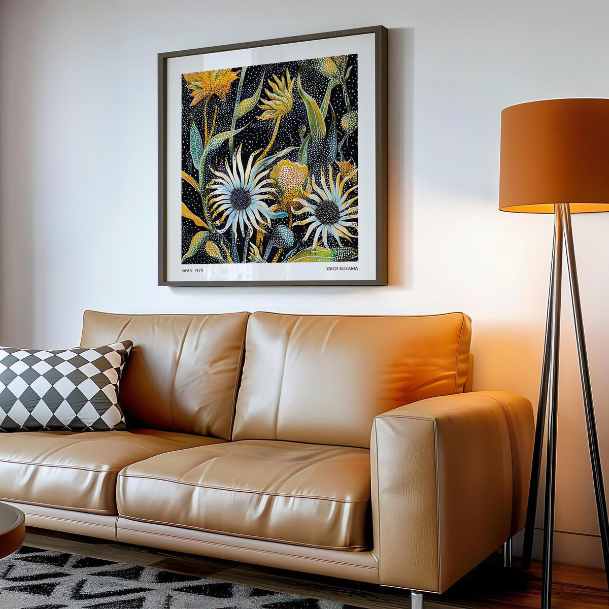 Abstract art floral print with dotted flowers in black white and yellow above a tan sofa with patterned cushion
