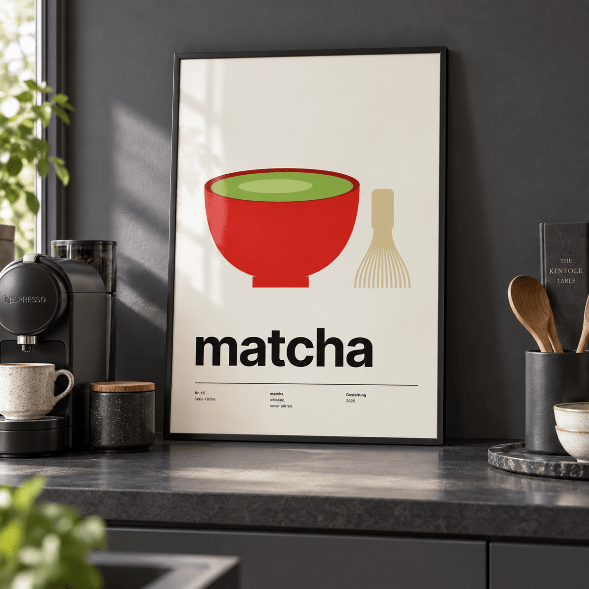 Matcha bowl and bamboo whisk print on a shelf in a kitchen against a charcoal wall