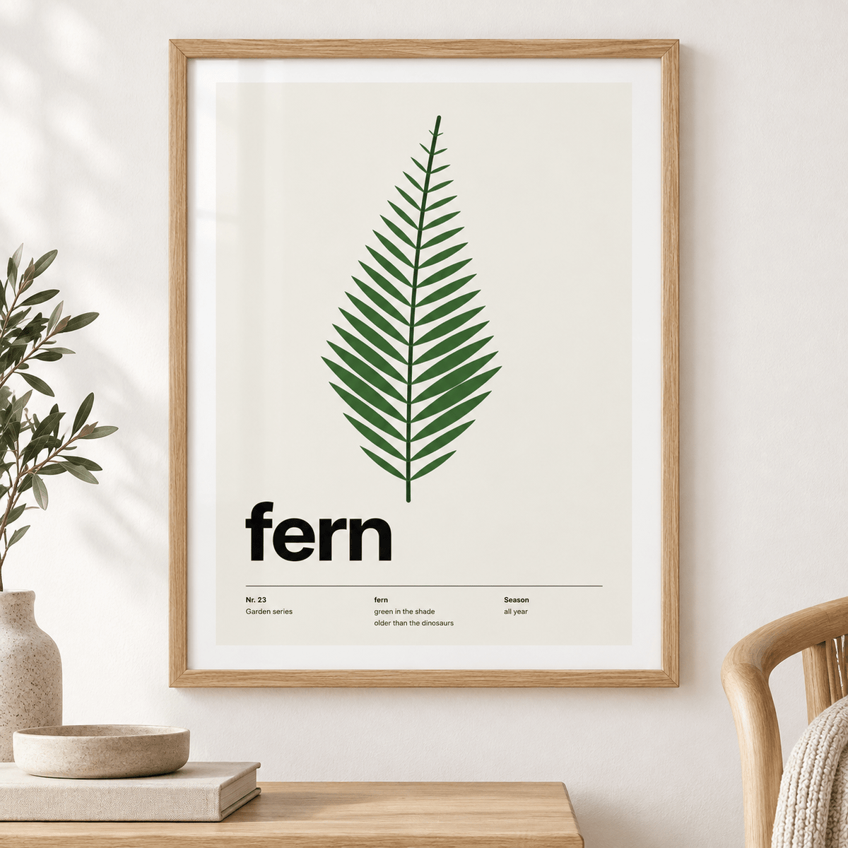 Close view of the single green fern frond showing the fine print detail
