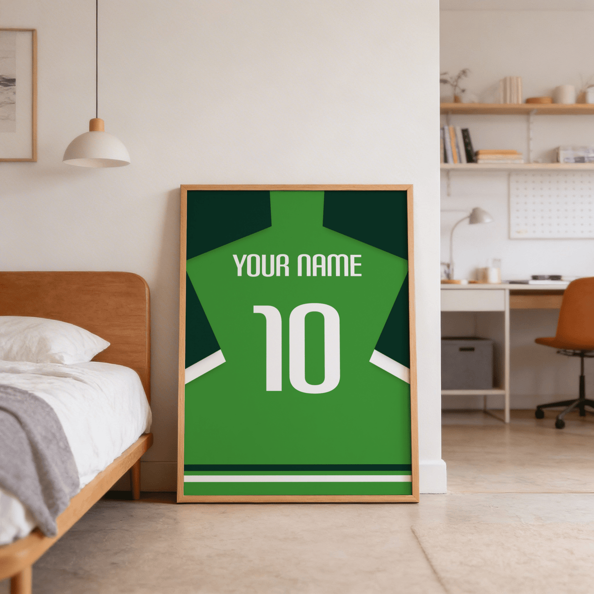 Print leaning on floor of football shirt poster in green with dark green sleeves and number 10 in a bedroom