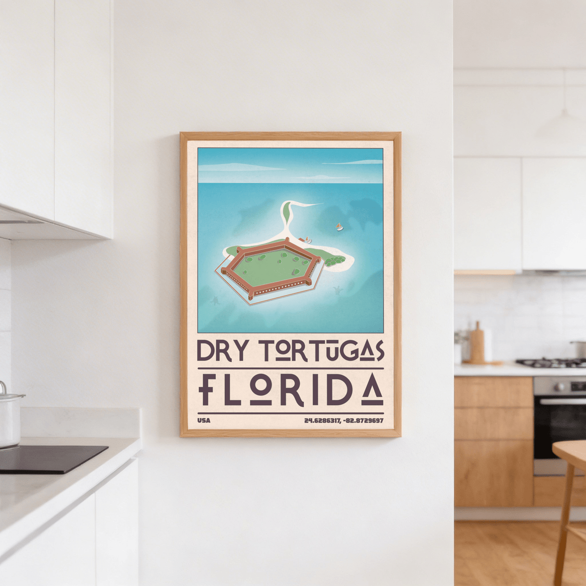 Dry Tortugas National Park Print hanging on a kitchen wall with wooden frame and white cabinets nearby