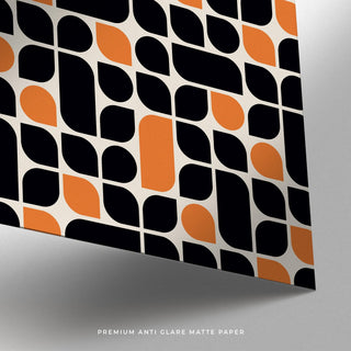 Interior scene with framed Bauhaus pattern poster above workspace.