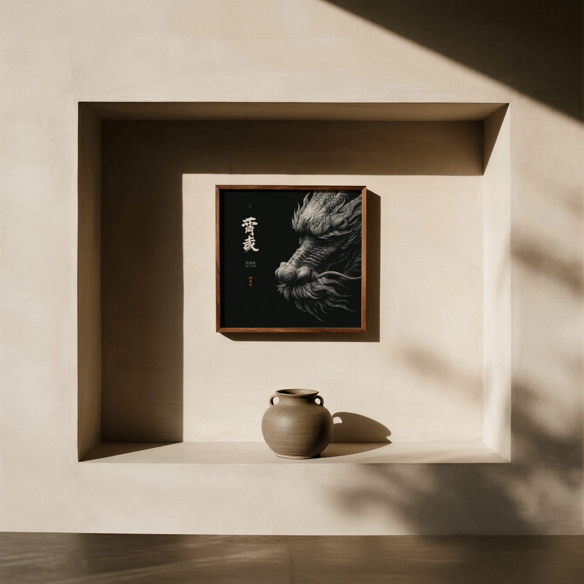 Dragon wall art of a Japanese ink style dragon head with white and grey tones above a ceramic vase