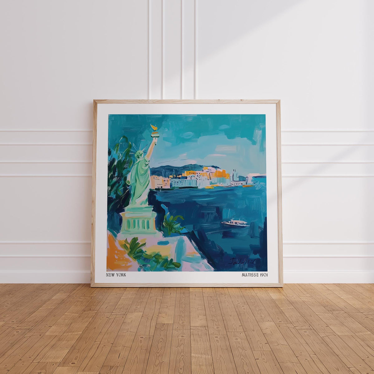 Holiday Posters framed print of statue of liberty illustration with blue and green watercolour leaning on wood floor