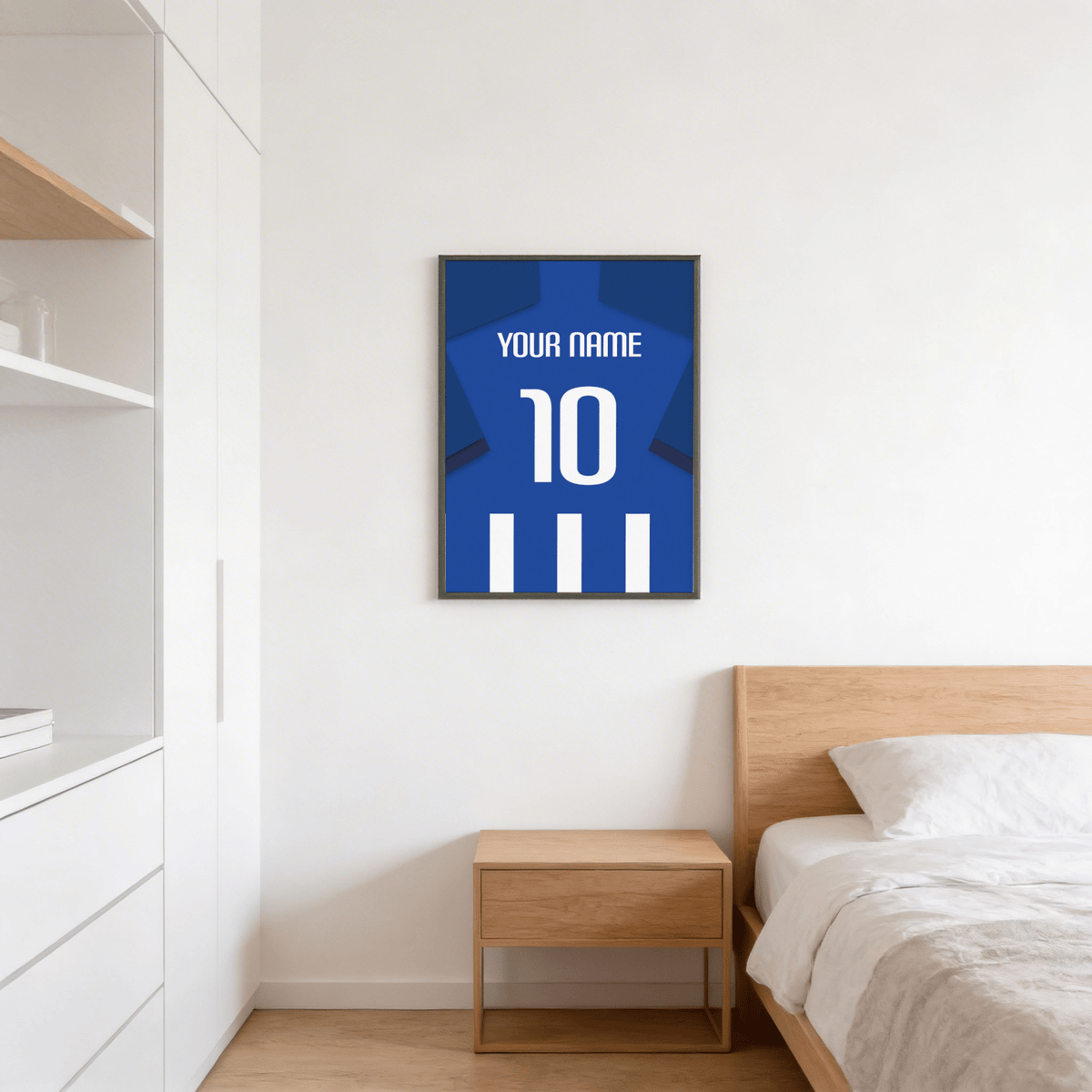 Football Shirt Poster in Blue and White Stripes with Dark Blue Sleeves above wooden bedside table in bedroom