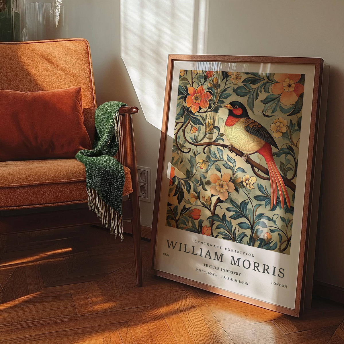 Bird Vintage Prints leaning print with an illustration of a songbird and orange flowers near an orange chair