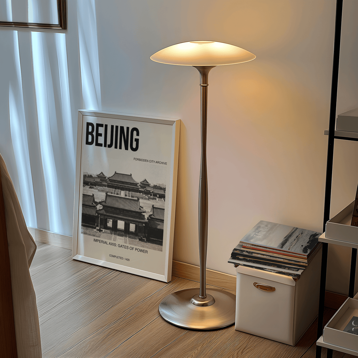 Print leaning on a floor next to a lamp and box featuring Beijing Architecture Art Print of forbidden city gates in black and white