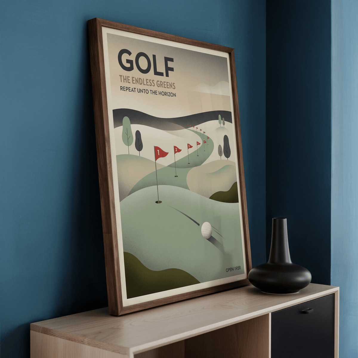 Framed Vintage Golf Wall Art print with golf course flags and a golf ball leaning on a sideboard next to a black vase