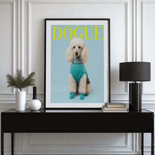 Pet Wall Decor framed print of white poodle in blue sweater on a sideboard with lamp and books