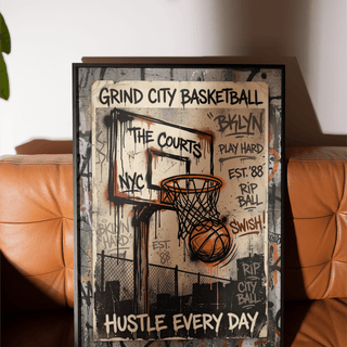 Basketball City wall art of a street-art style basketball hoop with orange and black colours on a brown leather chair