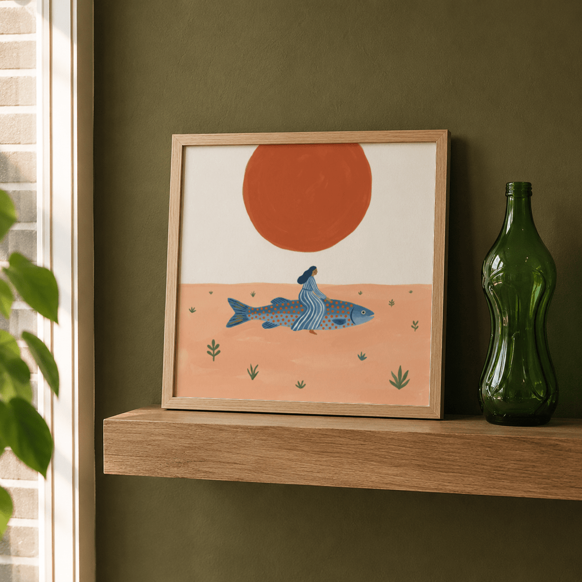 Surreal Fish Art Print framed close-up of woman riding blue spotted fish with large orange sun on wooden shelf with green bottle