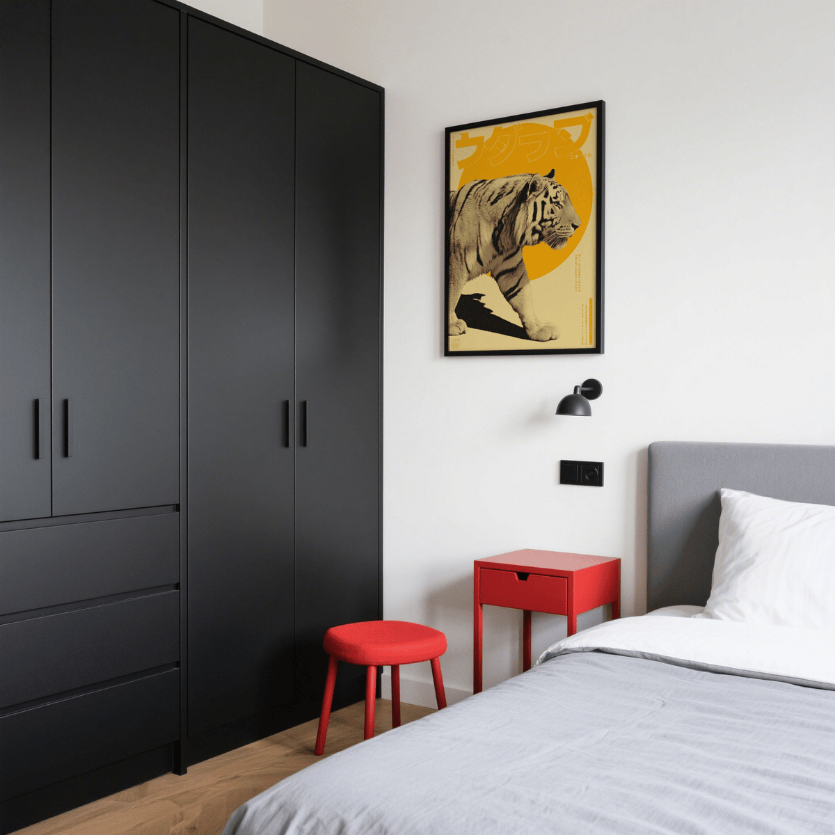 Tiger Art Print on a wall in a bedroom with black cabinets and red stool