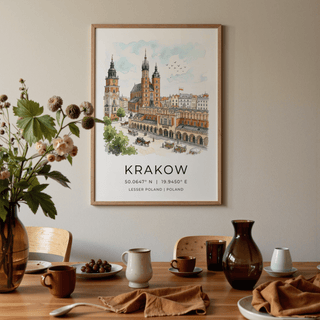 Krakow Cityscape wall art with watercolour illustration of old town buildings above a dining table with cups and a vase