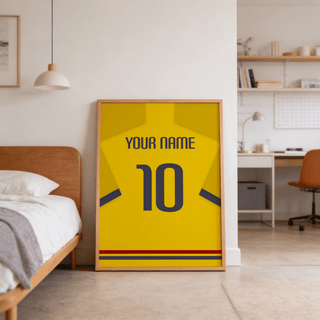 Football Shirt Poster in Yellow with Dark Blue Cuffs leaning against wall near bed in bedroom