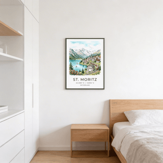 Print on a bedroom wall of Swiss village with lake and mountains in watercolour style above a wooden bedside table