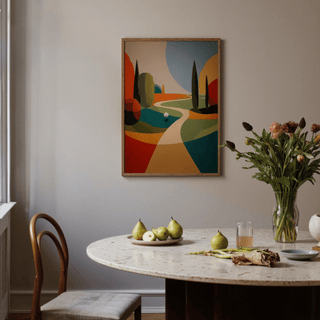 Colorful Golfing wall art of an abstract golf course with autumnal colours above a dining table with pears and a flower vase