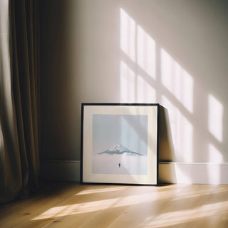 Framed Japan Travel Poster of snowy Mount Fuji with lone figure leaning against a wall with sunlight