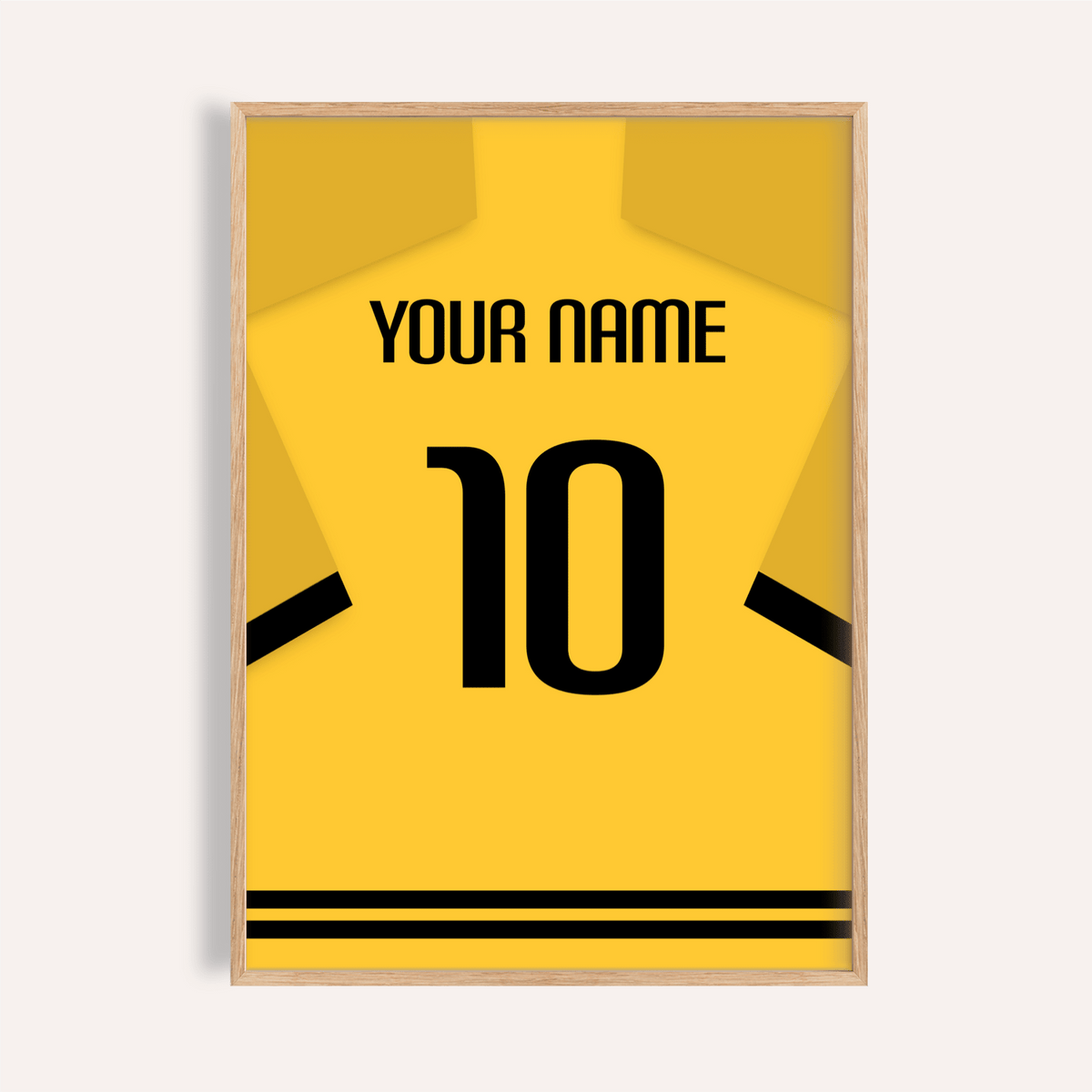 Framed print close-up of a yellow football shirt poster with black sleeve stripes and number 10