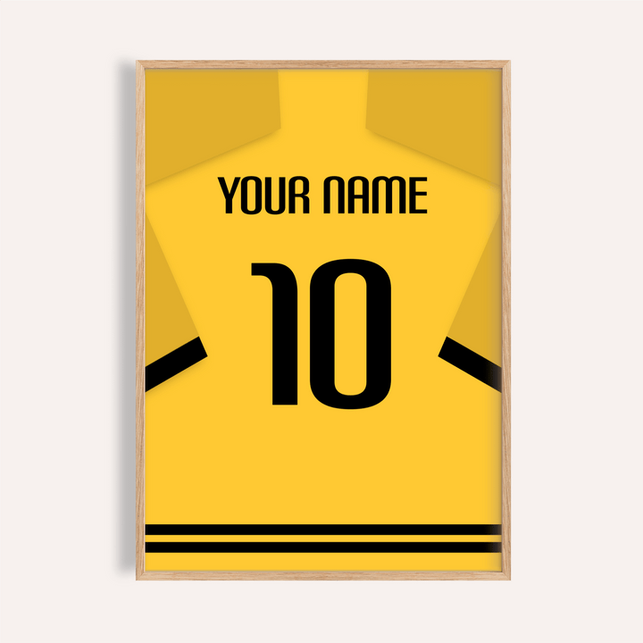 Framed print close-up of a yellow football shirt poster with black sleeve stripes and number 10