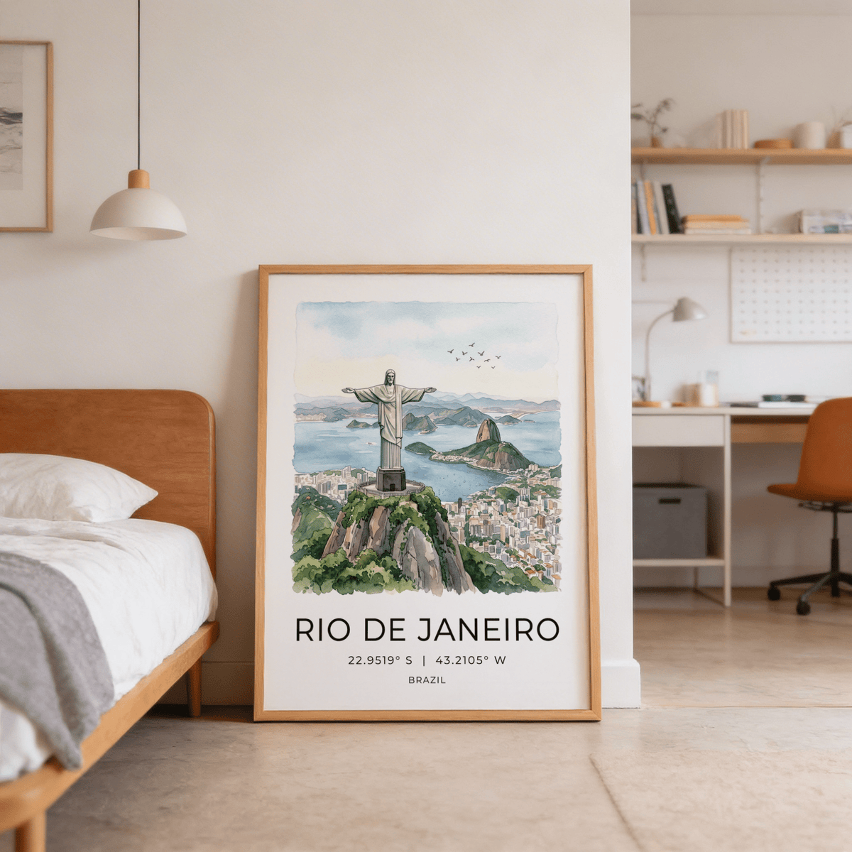 Cristo Redentor Poster print leaning on the floor with a beige wall and a bed nearby