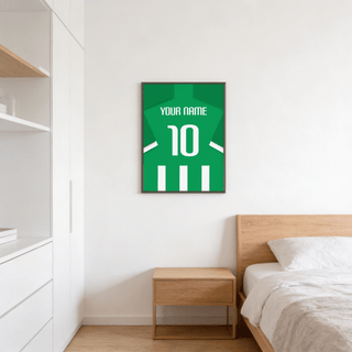 Football Shirt Poster in Green and White Stripes on a bedroom wall above a wooden bedside table