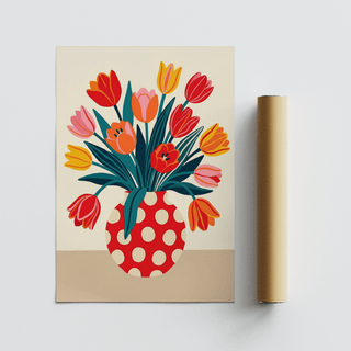 Rolled print alongside floral art print of a tulip bouquet in a red and white polka dot vase