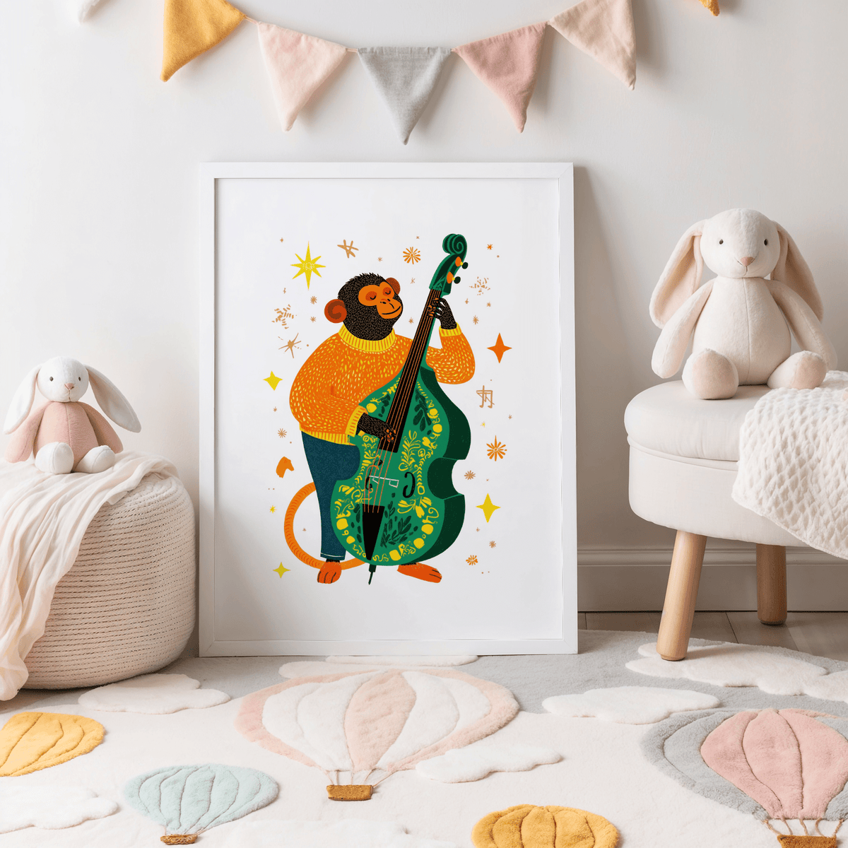 Musical Monkey Art Print on a wall print leaning in a nursery with soft toys and a bunting