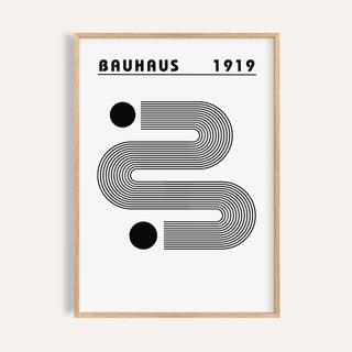 Framed black and white minimalist art with curved linear shapes and two bold dots