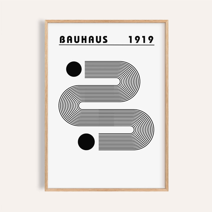 Framed black and white minimalist art with curved linear shapes and two bold dots
