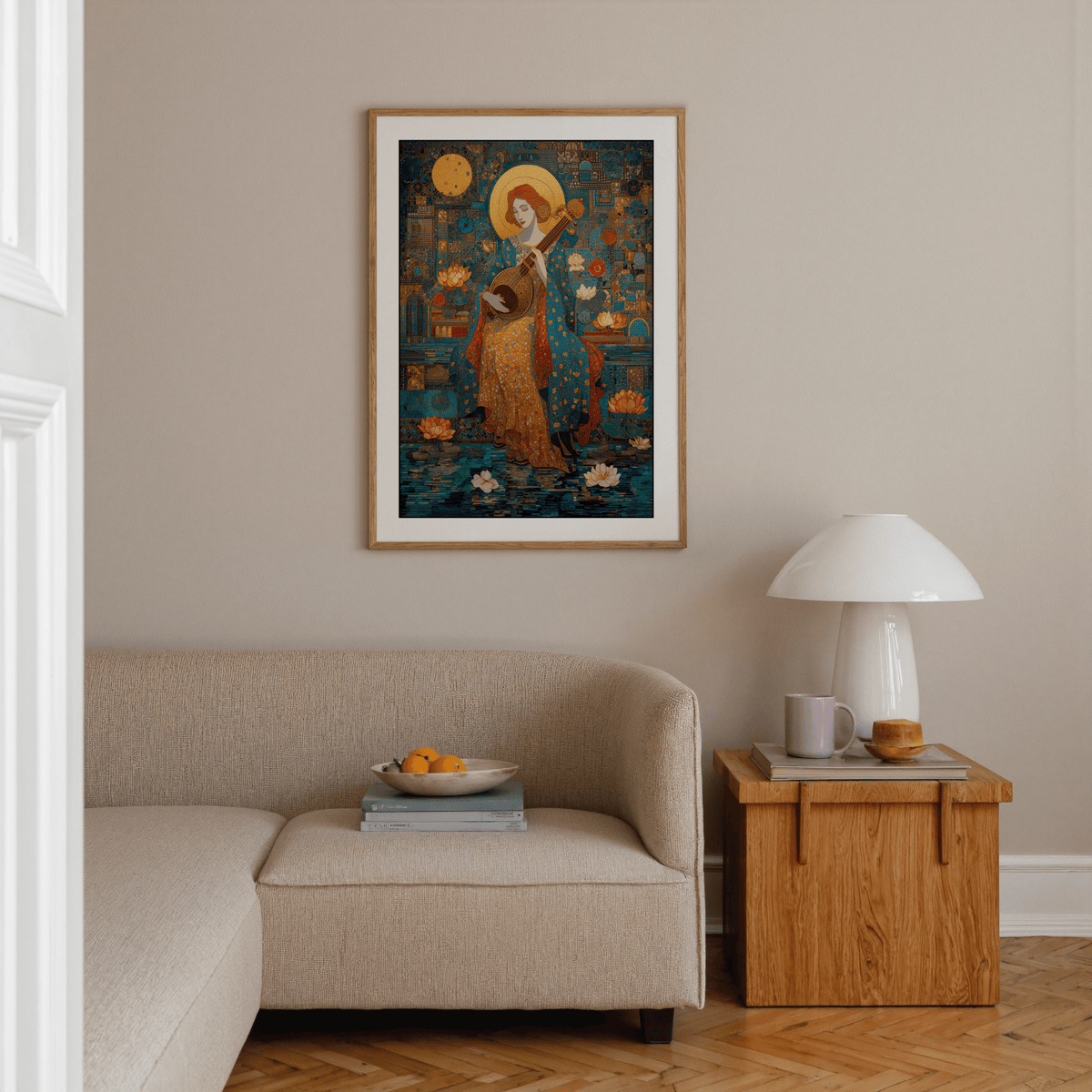 Print on a wall in a living room of a woman playing lute with blue and gold hues above a beige sofa