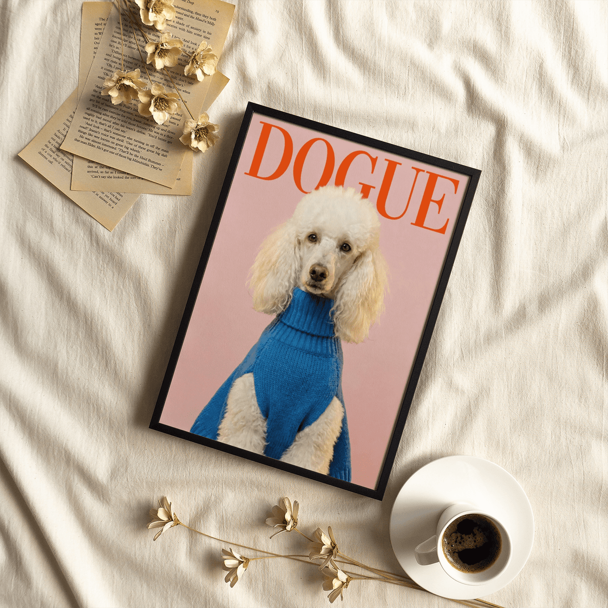 Framed Dogue Poodle Print of a white poodle in a blue sweater on cream fabric with coffee cup
