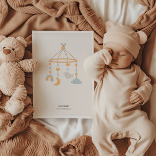 Personalised Baby Poster with minimalist bird moon mobile illustration beside sleeping baby in bear hat