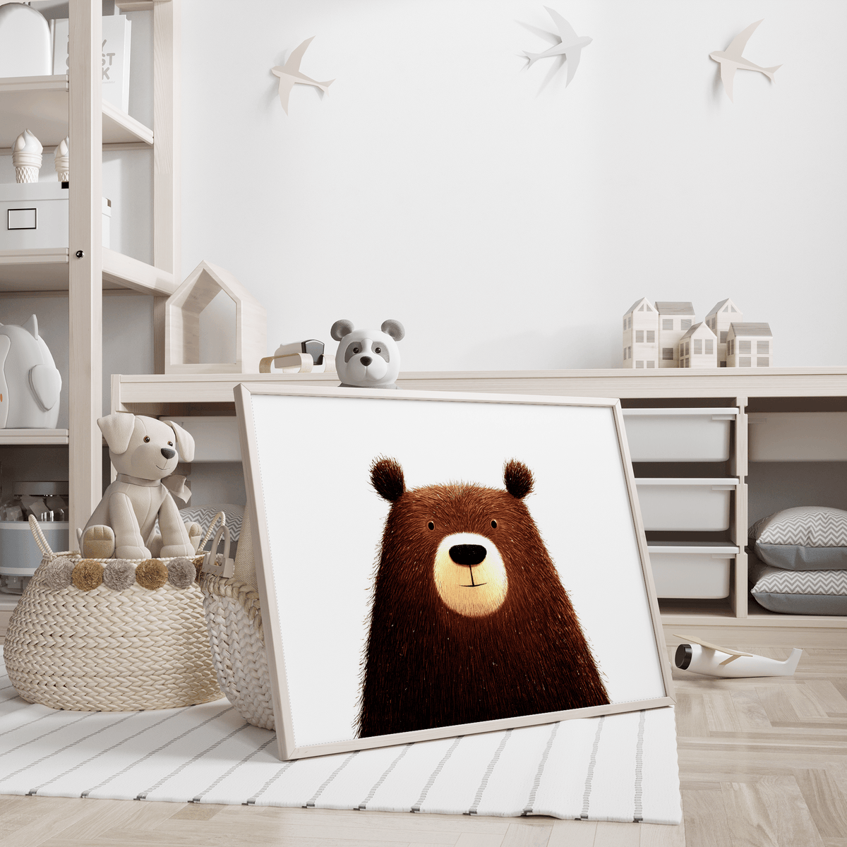 Print leaning on a striped rug with cute brown bear illustration in a children's room with toys