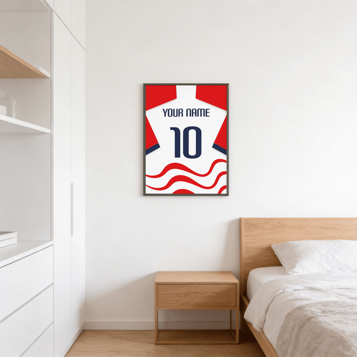 Football Shirt Poster in White with Red Wave Pattern on a bedroom wall above a wooden bedside table