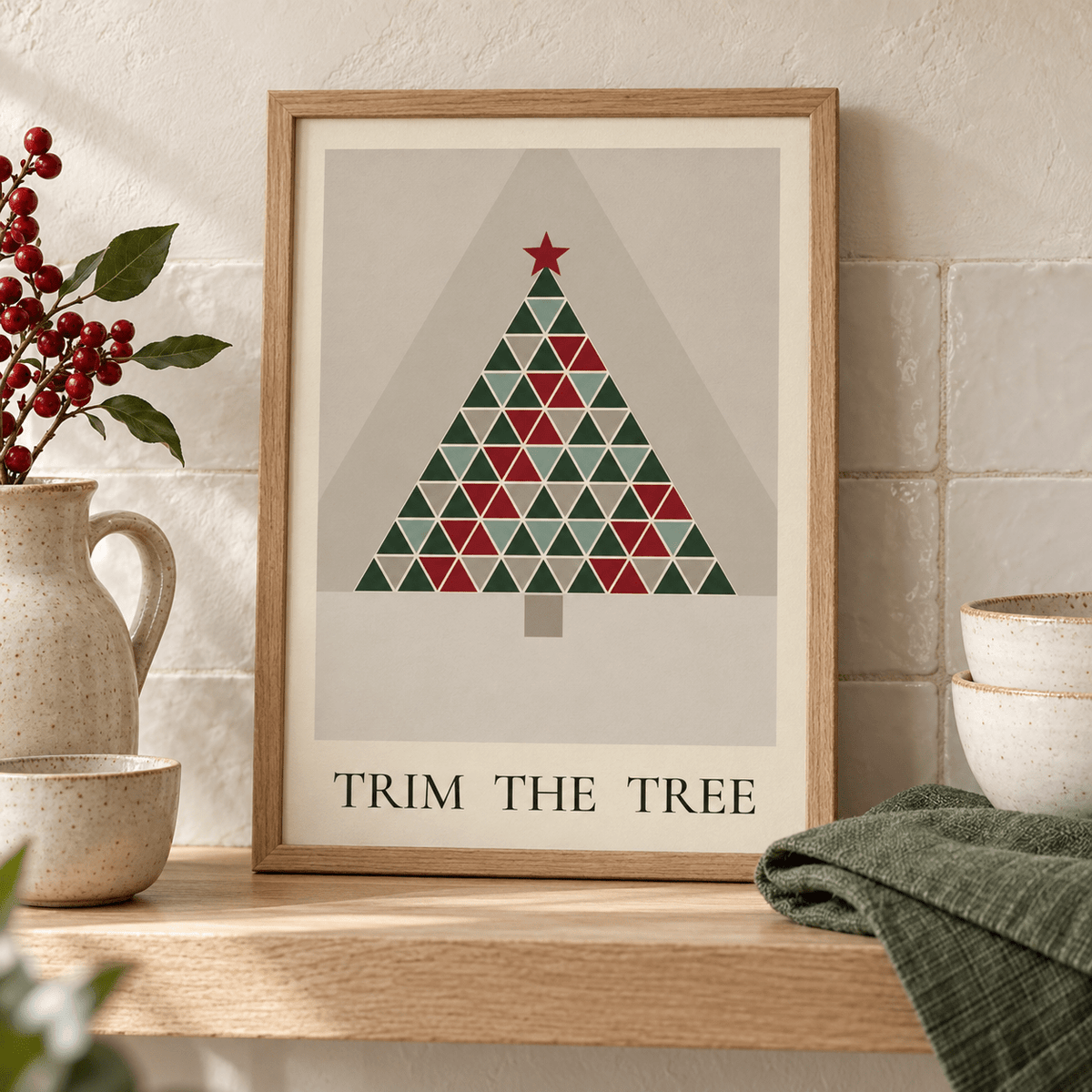 Close view of the red and green quilt tree print styled on a kitchen shelf