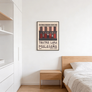 Print of Teatro Lara wall art with red and pink theatre facade above a bedside table