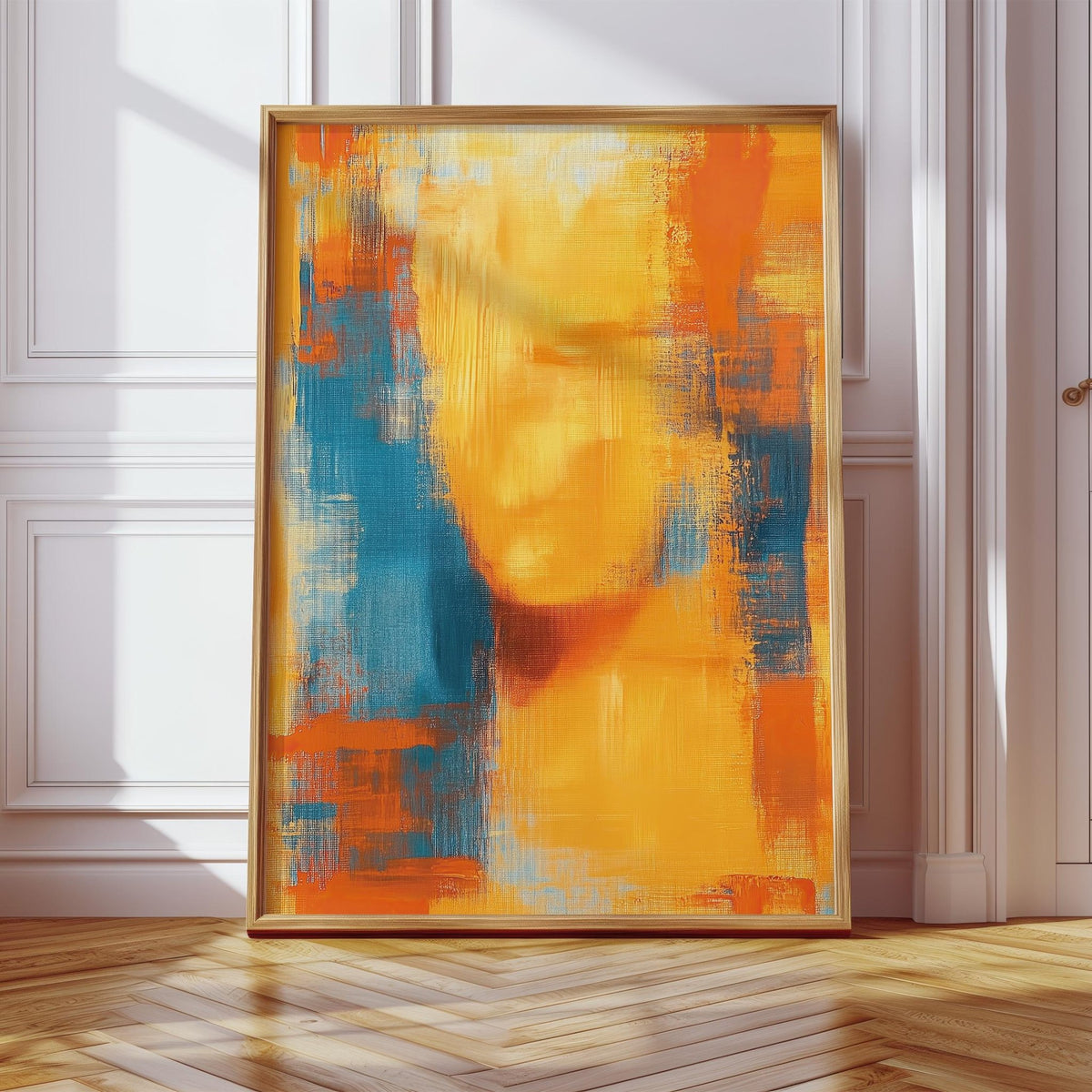 Blue and Orange Abstract Art print leaning against white wall with parquet floor and sunlight