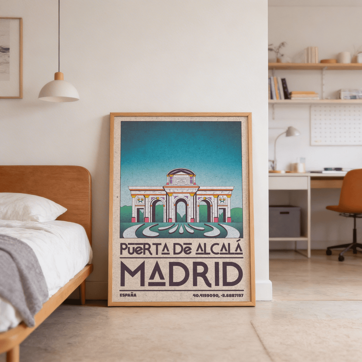Madrid Architecture Poster leaning on the floor showing Puerta de Alcalá with bright blue sky in a bedroom