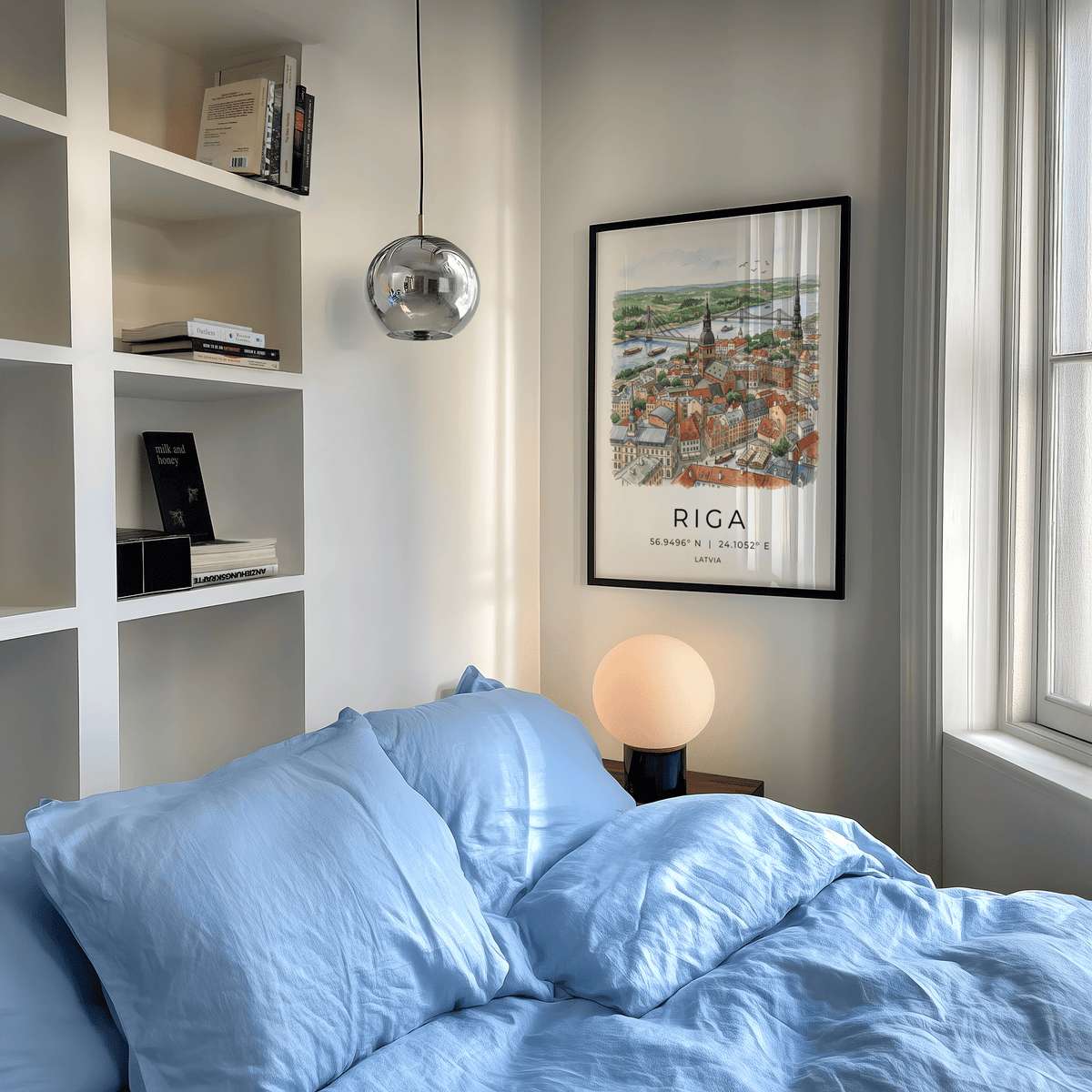 Riga City Art Print framed print on a grey wall above a light blue bed with a glowing lamp