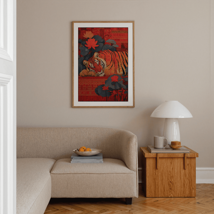 Indian Tiger wall art of a sleeping tiger with red and dark blue tones above a beige sofa