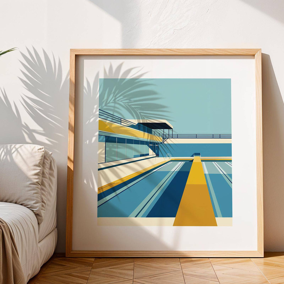 Framed Pool Print showing an urban swimming pool with blue and yellow blocks in sunlight and palm shadow