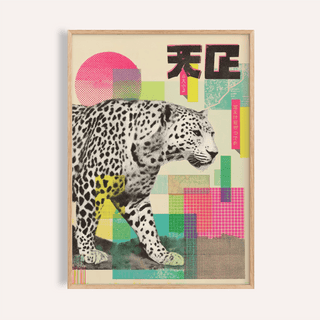 Framed close-up of abstract leopard print with bright pink, green, and yellow blocks