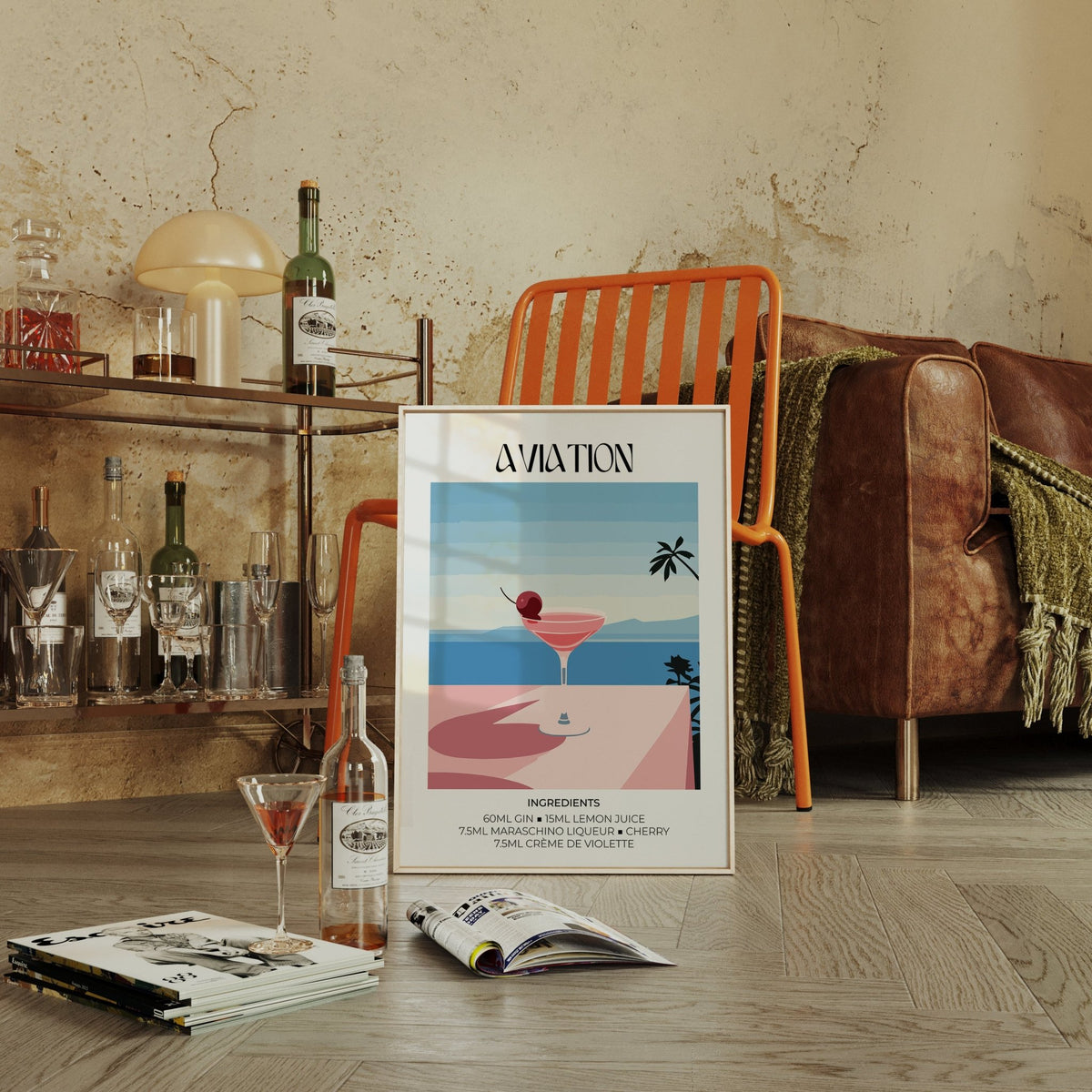 Prints of Cocktails showing an aviation cocktail glass illustration with blue and pink tones leaning against an orange chair