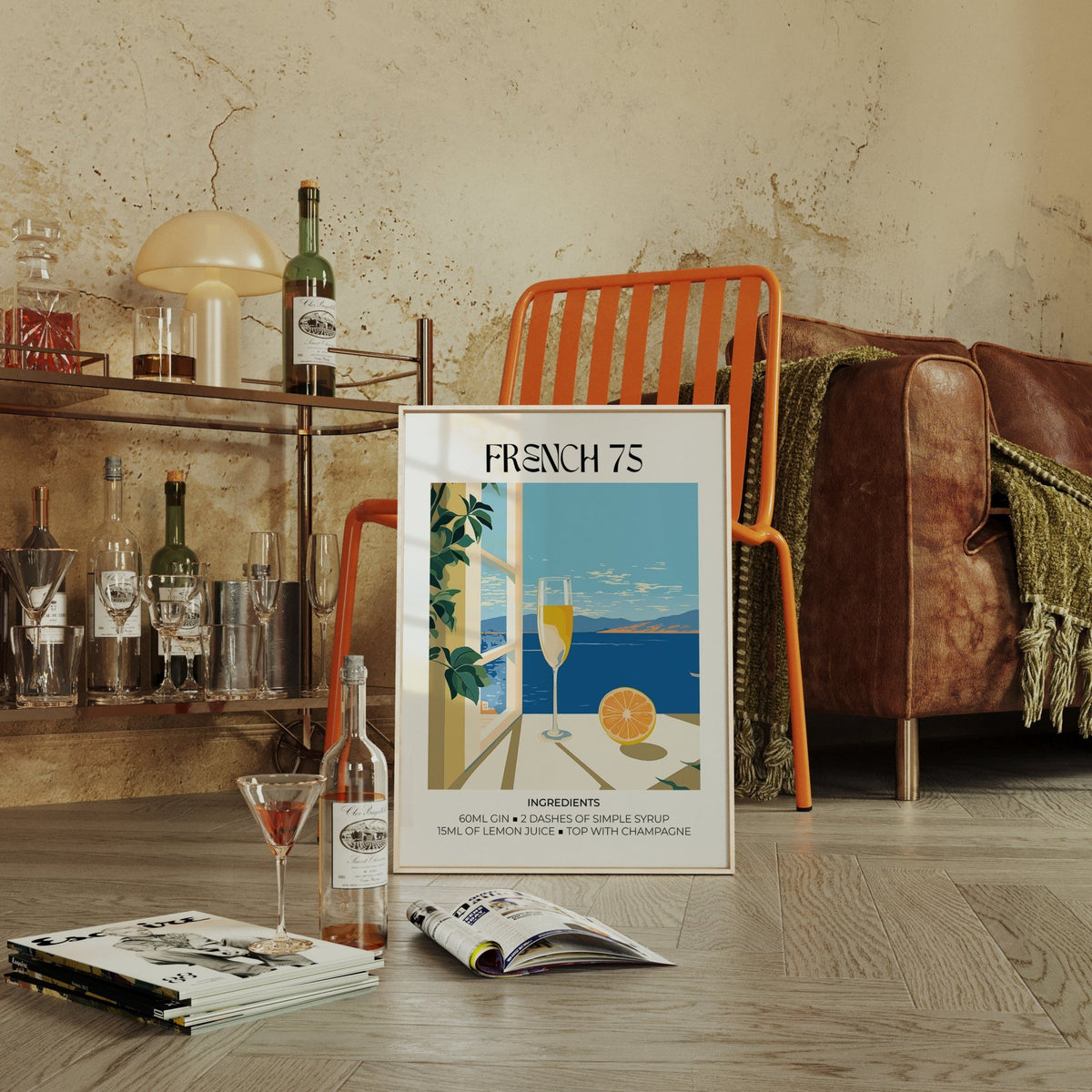 Bar Artistique wall art of a French 75 cocktail print leaning on the floor beside an orange chair and a brown sofa
